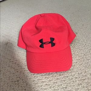 Red under armor hat.